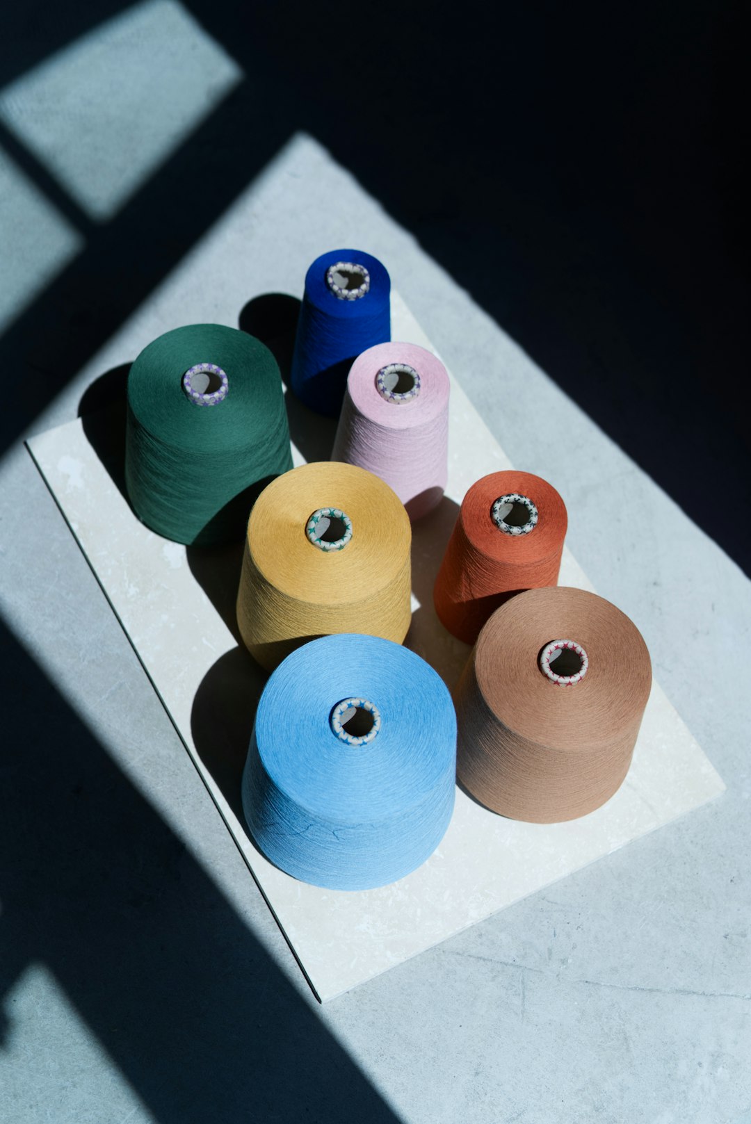 Yarn spools used for towel production at towel.studio in Berlin, Germany.